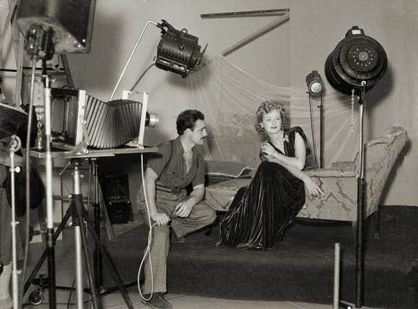 Typical studio set up, with the large "hot lights" and cumbersome sheet film camera.